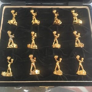 Gold plated vintage place settings, cherubs decorative Xmas or Special dinner .
